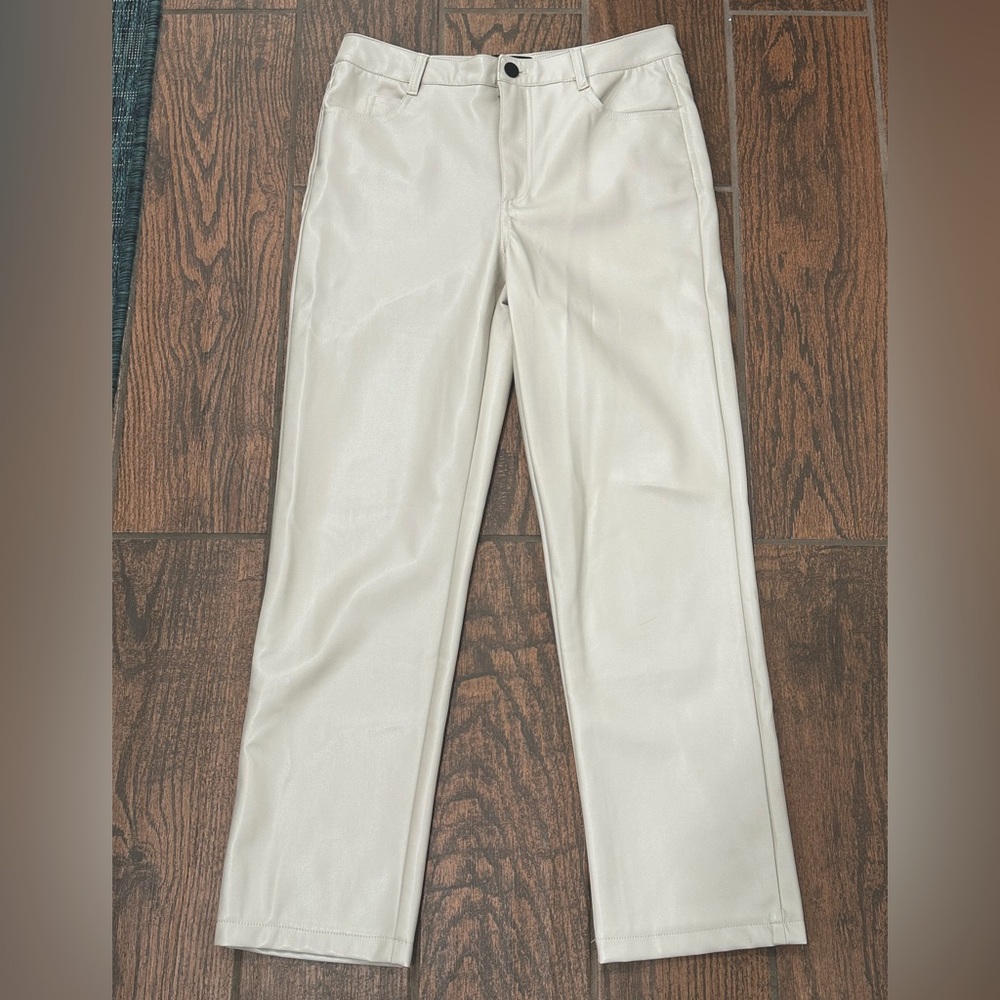 Faux leather cream pants with soft lining inside.  Excellent/like new condition